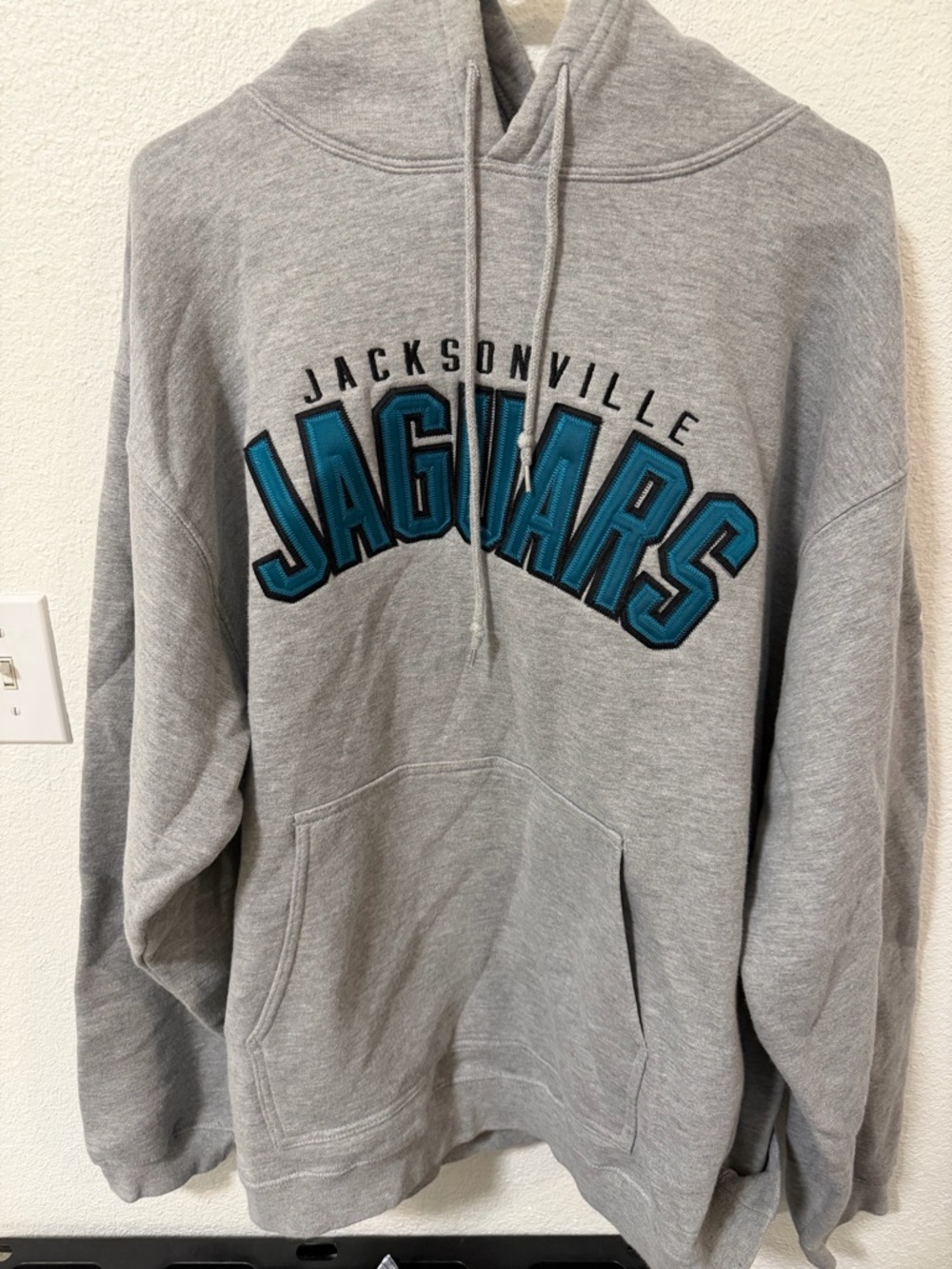 Reebok Gray Hoodie with Teal Jaguars Script